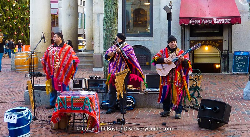 Street performers playing music in Faneuil Hall Marketplace Street performers playing music in Faneuil Hall Marketplace